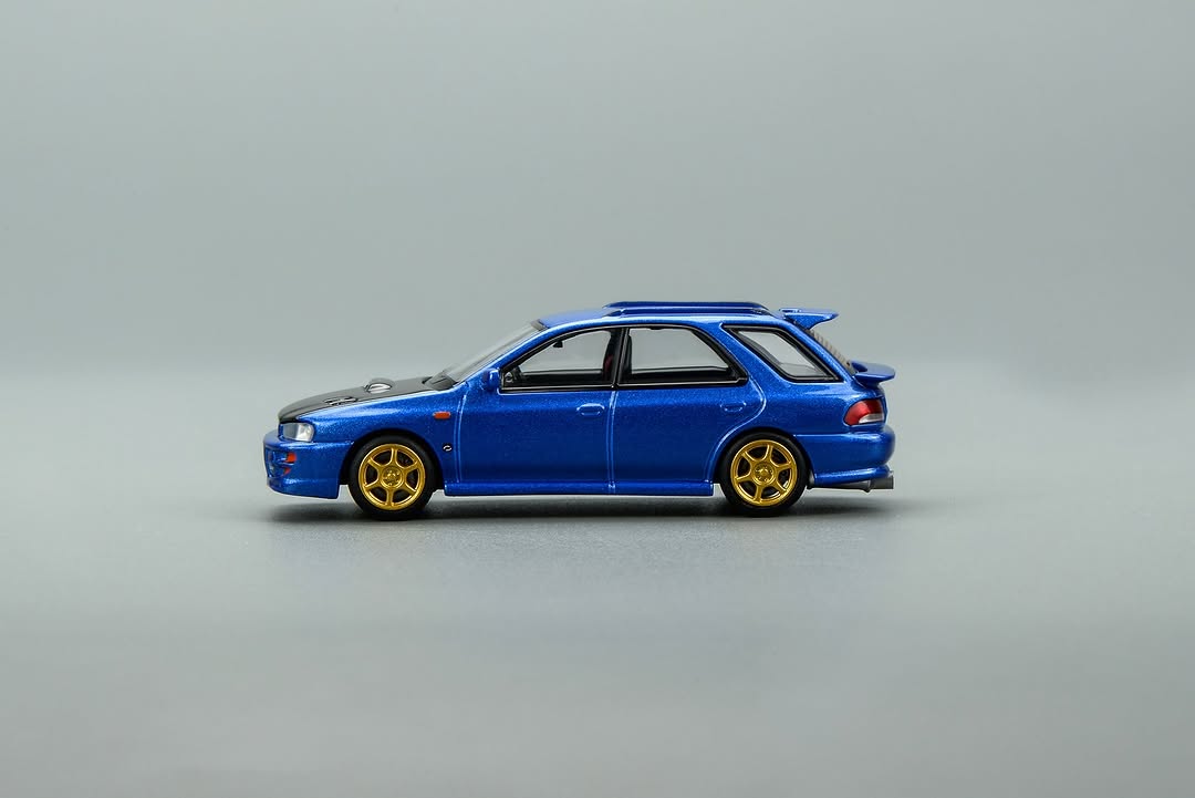 *PREORDER* MotorHelix 1:64 Subaru Impreza Wagon WRX STi Ver. VI Customized in World Rally Blue Mica with Carbon Bonnet