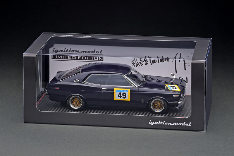 Ignition Model 1:18 Nissan Laurel 2000SGX (C130) Purple Circuit Ver. With Mr. Sata Figure