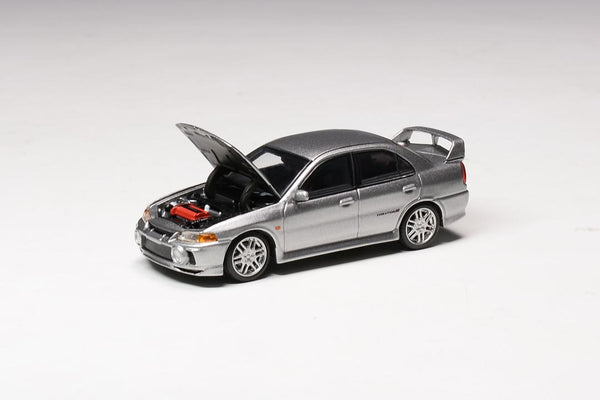 *PREORDER* MotorHelix 1:64 Mitsubishi Lancer EVO IV in Steel Silver Metallic