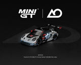 *PREORDER* MINI GT 1:64 Porsche 911 GT3 R (992) #77 AO Racing “Skeleton Rexy” 2026 IMSA Petit Le Mans – (Glow in the Dark)