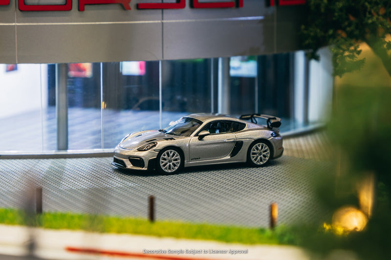 Tarmac Works 1:64 Porsche Cayman GT4 RS in GT Silver Metallic