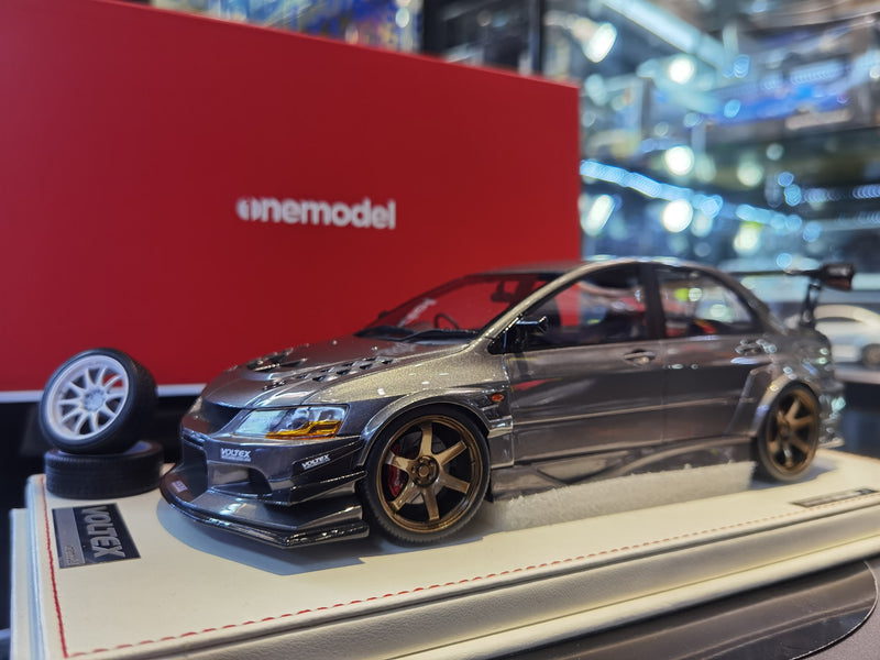 One Model 1:18 Mitsubishi Lancer Evolution IX Voltex Iron Gray