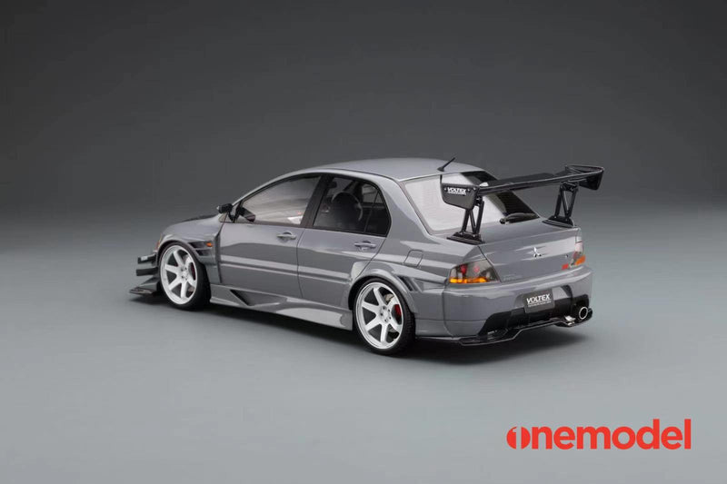 One Model 1:18 Mitsubishi Lancer Evolution IX Voltex with Carbon Bonnet in Iron Gray