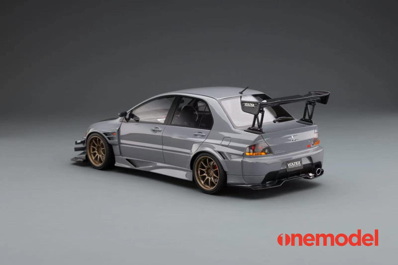 One Model 1:18 Mitsubishi Lancer Evolution IX Voltex with Carbon Bonnet in Iron Gray