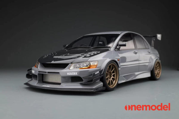 One Model 1:18 Mitsubishi Lancer Evolution IX Voltex with Carbon Bonnet in Iron Gray