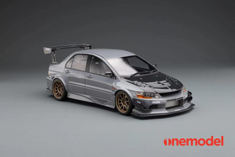 One Model 1:18 Mitsubishi Lancer Evolution IX Voltex with Carbon Bonnet in Iron Gray