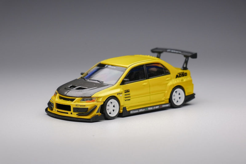 Peako Models 1:64 Mitsubishi Lancer Evolution IX Varis Edition in Yellow Metallic