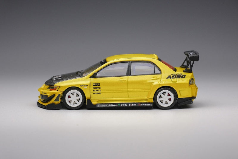 Peako Models 1:64 Mitsubishi Lancer Evolution IX Varis Edition in Yellow Metallic