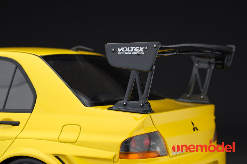 One Model 1:18 Mitsubishi Lancer Evolution IX Voltex with Carbon Bonnet in Yellow