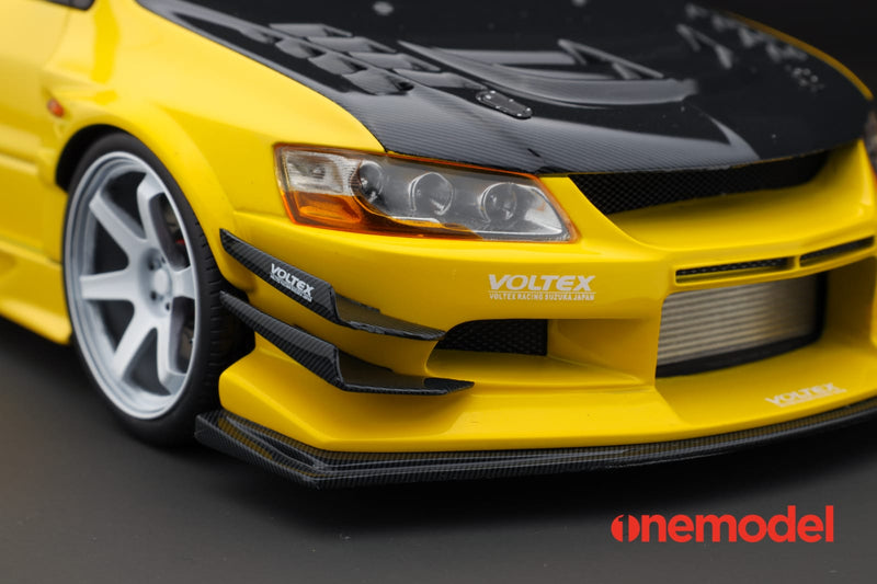 One Model 1:18 Mitsubishi Lancer Evolution IX Voltex with Carbon Bonnet in Yellow