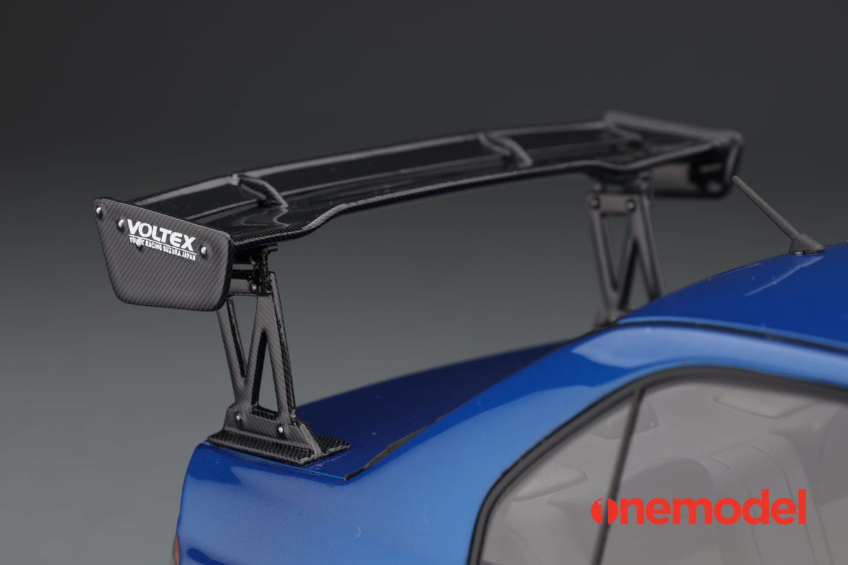 One Model 1:18 Mitsubishi Lancer Evolution IX Voltex with Carbon Bonnet in Blue