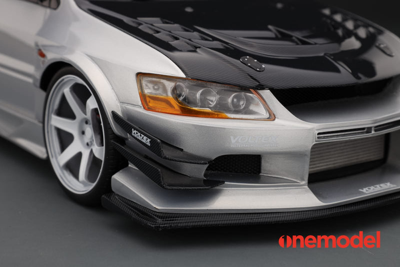 One Model 1:18 Mitsubishi Lancer Evolution IX Voltex with Carbon Bonnet in Silver