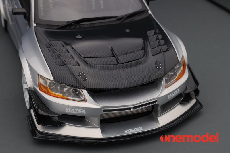 One Model 1:18 Mitsubishi Lancer Evolution IX Voltex with Carbon Bonnet in Silver