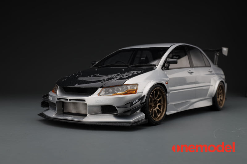 One Model 1:18 Mitsubishi Lancer Evolution IX Voltex with Carbon Bonnet in Silver