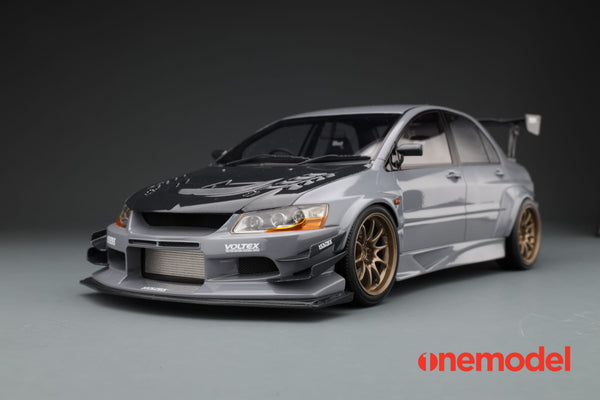 One Model 1:18 Mitsubishi Lancer Evolution IX Voltex with Carbon Bonnet in Cement Gray