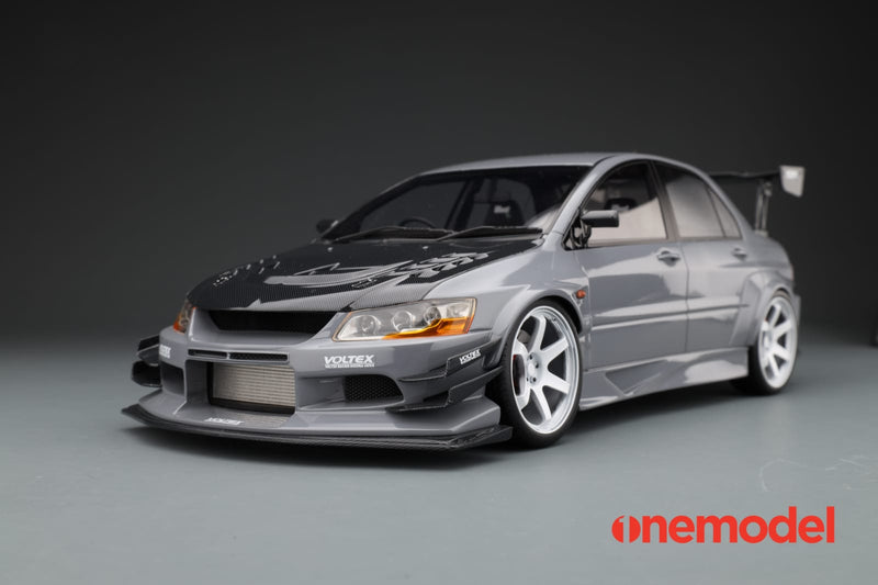 One Model 1:18 Mitsubishi Lancer Evolution IX Voltex with Carbon Bonnet in Cement Gray