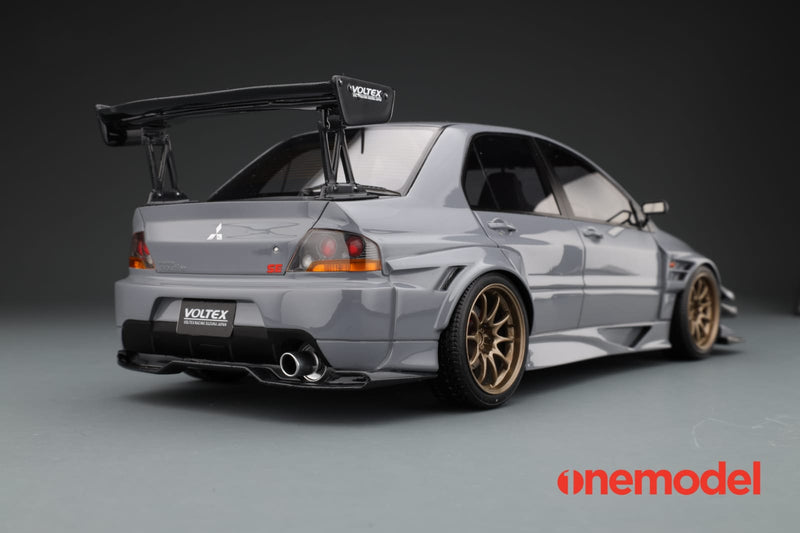 One Model 1:18 Mitsubishi Lancer Evolution IX Voltex with Carbon Bonnet in Cement Gray